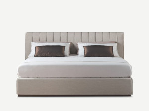 Кожаная или тканевая кровать