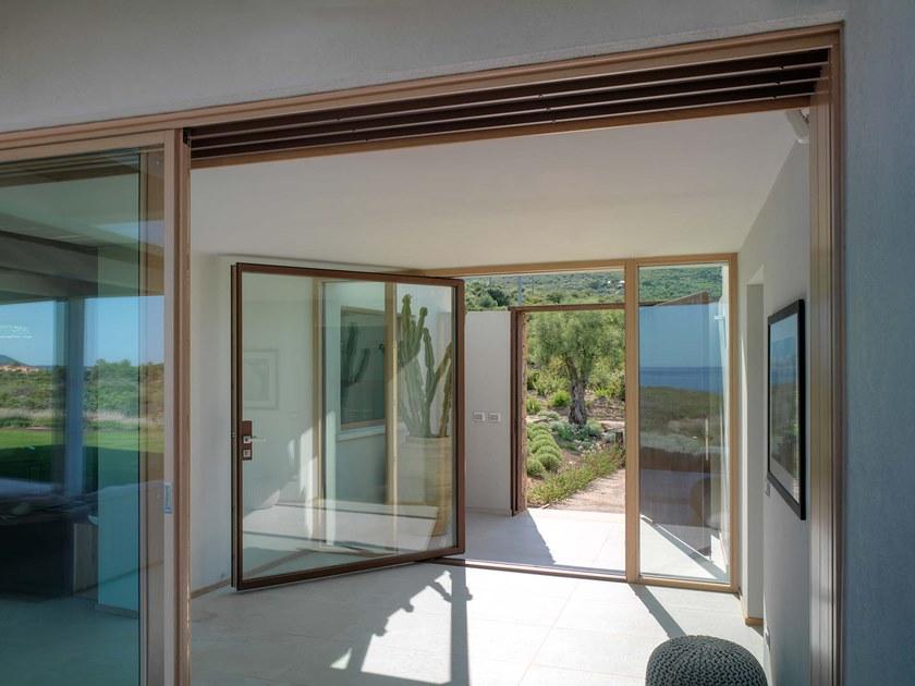 CARMINATI SERRAMENTI Деревянная поворотная дверь Skyline system sun-id-1398245 - Вид №1