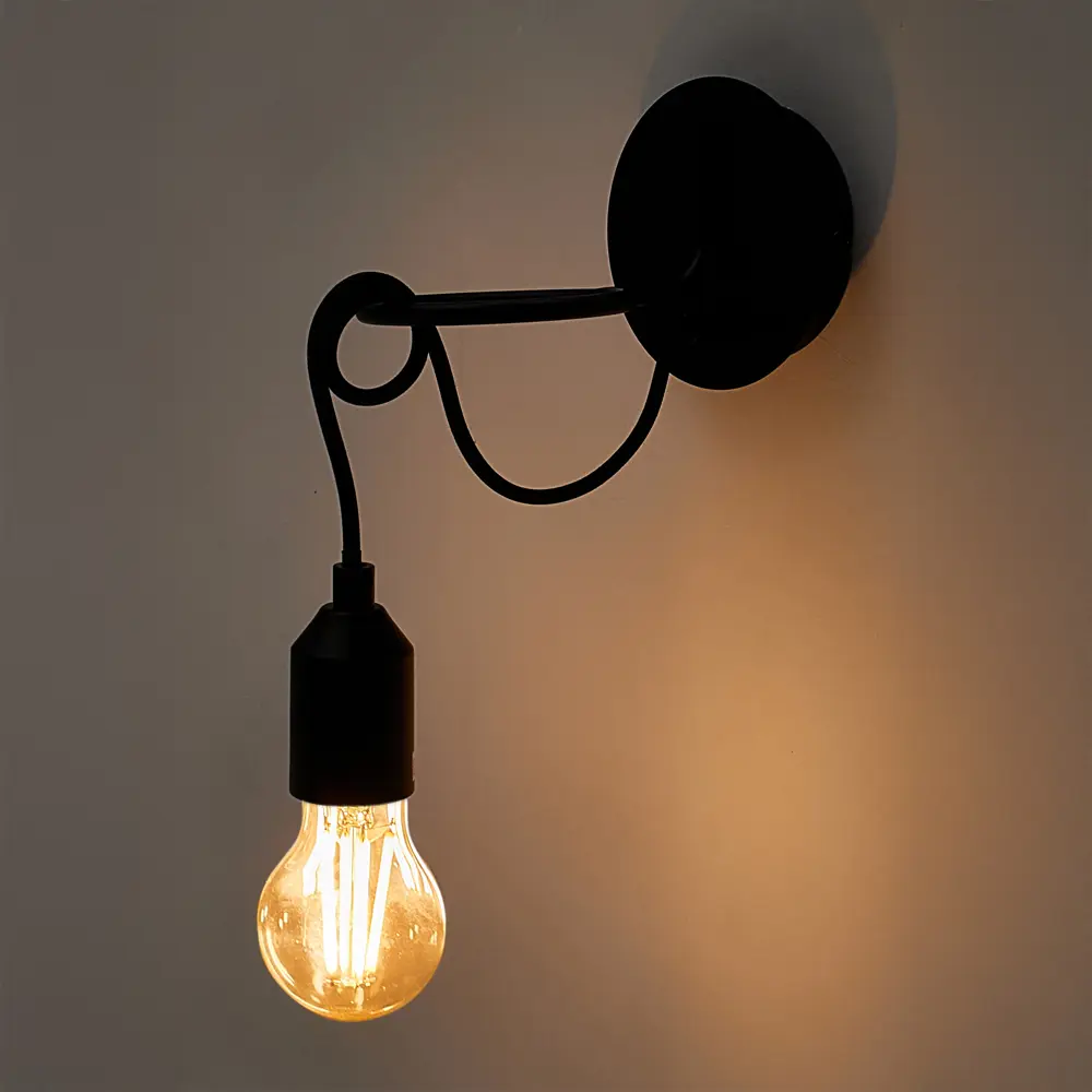 Настенный светильник Kreaforta Huron с гибким шнуром и черным матовым корпусом 89386804 STLM-1566511