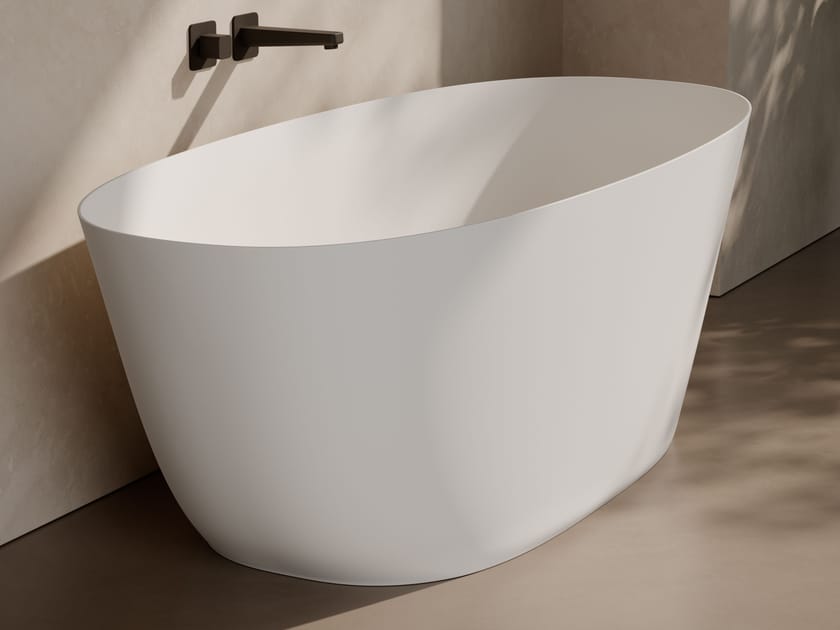 Овальная ванна в центре комнаты в твердой поверхности Ceramica Globo XENIA ARCH-00026989