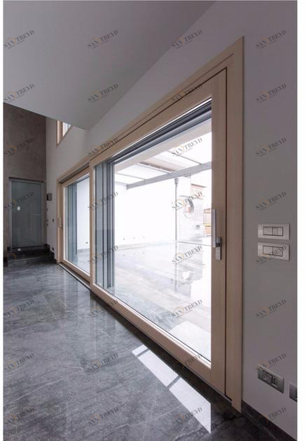 CARMINATI SERRAMENTI Копланарные французские двери из алюминия и дерева с тройным остеклением Passive 120 sun-id-1477325