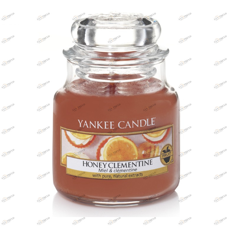 Свеча маленькая в стеклянной банке "Медовый клементин" Honey Clementine 104гр 25-45 часов YANKEE CANDLE  267914 Оранжевый 